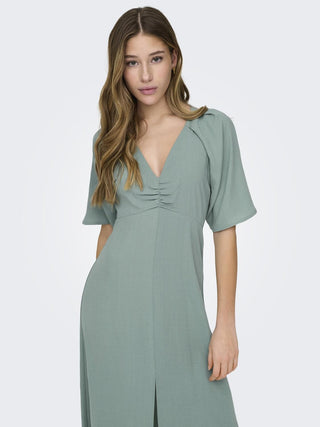 JDY Divya Ladies Short Sleeve Pleated Dress  Main fabric: 51% Recycled Polyester, 49% Polyester Hidden side zip fastening, Button fastening Regular Fi-GREEN