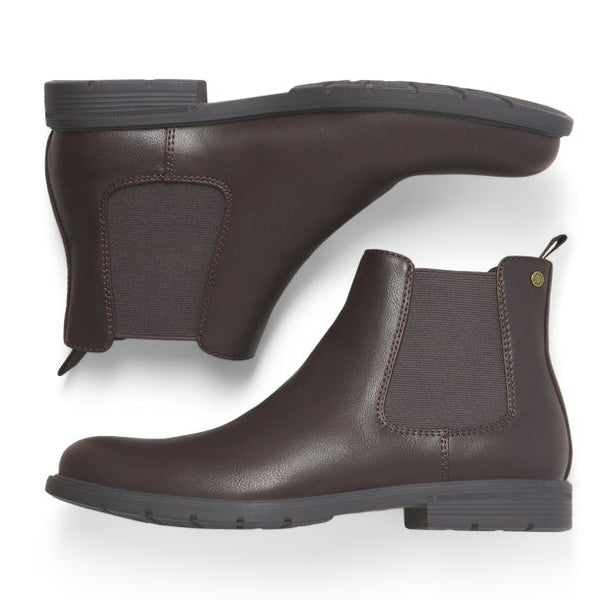 Pair of brown leather ankle boots on a white background