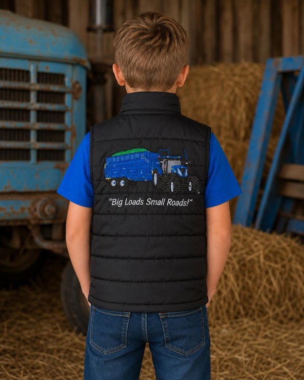 Back view of a boys black farm gilet with blue tractor and trailer embroidery.