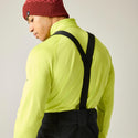 Rear close-up of adjustable braces and high-backed waist on black Dare2b Achieve III ski trousers
