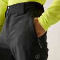 Close-up of Dare2b Achieve III black ski trousers showing adjustable waistband and zipped pocket

