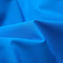 Dare2b Eagle IV Athletic ski jacket close-up of blue stretch fabric texture
