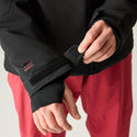 Dare2b Eagle IV Men's Ski Jacket in Black showing Adjustable Cuff and Inner Stretch Cuff Detail
