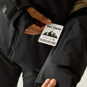 Dare2b Halfpipe IV Pepper ski jacket showing ski pass pocket and cuff detail
