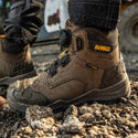 DeWalt Foundry Gunsmoke waterproof safety boot worn on wet rocky ground