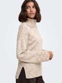 Side view of JDY Sabine Oatmeal jumper showing ribbed cuff and side split hem
