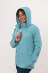 Lighthouse Beachcomber Ladies Waterproof Jacket | Lightweight Raincoat - Borderland Muff - blue
