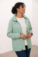 Lighthouse Beachcomber Ladies Waterproof Jacket | Lightweight Raincoat - Borderland Muff - green