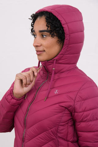 Lighthouse Laurel women's coat in Berry with hood up and drawcord detail