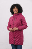 Woman wearing Lighthouse Laurel Berry coat in three-quarter front view