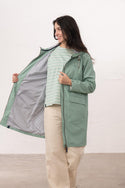Lighthouse Lucy Long Ladies Showerproof Jacket | Rubberised Raincoat - Borderland Muff