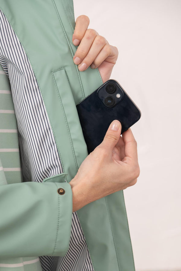 Lighthouse Lucy Long Ladies Showerproof Jacket | Rubberised Raincoat - Borderland Muff