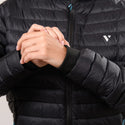 Model showing front quilting and sleeve cuff of Mac in a Sac Nova women’s Jet Black down jacket
