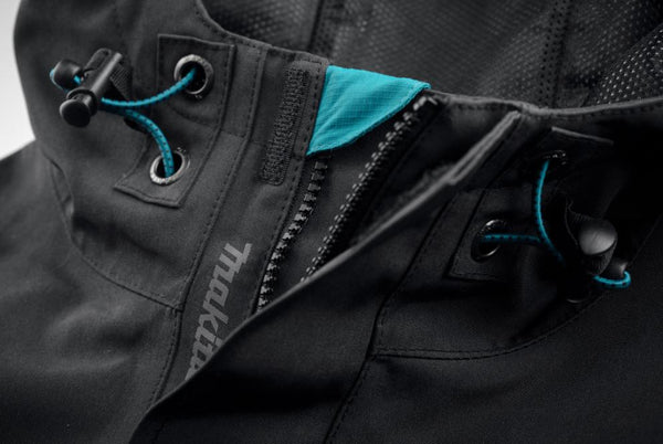 Close-up of a black jacket with blue interior lining and Makita brand logo.