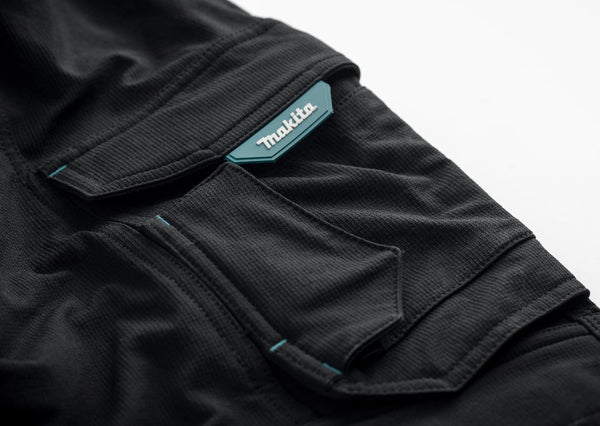 Makita Onyx Stretch Trousers MK304M slim fit work trousers with holster pockets and cargo pockets
