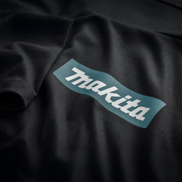 Makita logo on a black fabric background