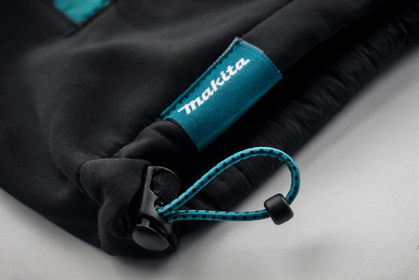 Hem toggle featuring the Makita logo on a light gray background
