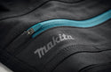 Heavy-duty YKK zip and rubberised button fastening on Makita work trousers