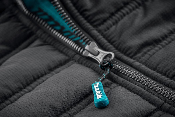 Close-up of a zipper on a black jacket with a blue pull tab, featuring the Makita brand.