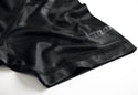 Black Makita T-shirt sleeve with a brand logo on a white background