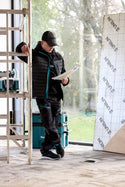 Men's Makita Vector work trousers with reinforced knee pad pockets