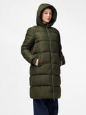 Person wearing a green puffer coat on a white background