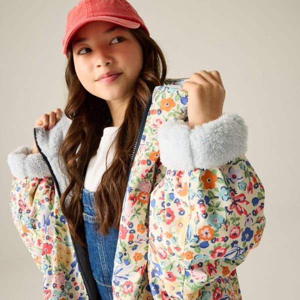 Cath Kidston kids waterproof changing robe in Cream Ditsy worn by mode