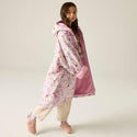 Cath Kidston kids waterproof changing robe in Pink Floral worn by model