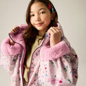Cath Kidston kids waterproof changing robe in Pink Floral worn by model