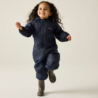 Child wearing Regatta Splosh III Navy waterproof suit with patterned wellies