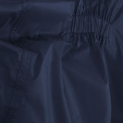 Close-up of dark navy blue fabric with a gathered elastic waistband and stitched seam details.