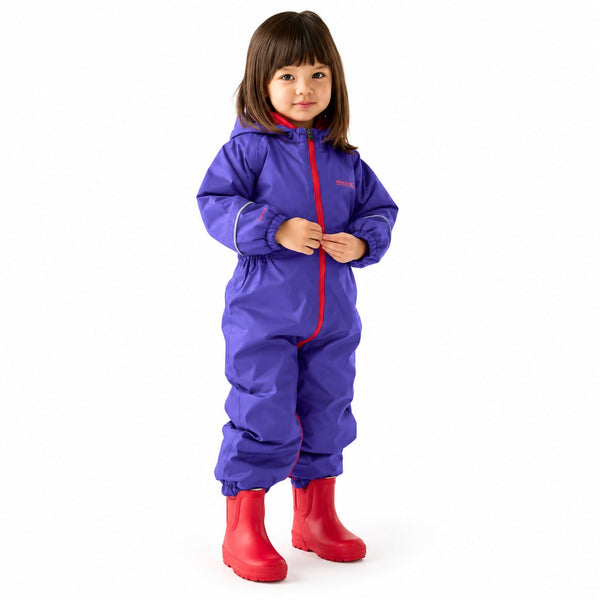 Child wearing Regatta Splosh III Peony waterproof suit with red wellies