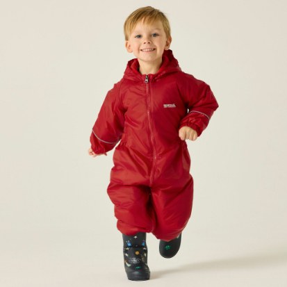 Child wearing Regatta Splosh III Pepper waterproof suit with wellies